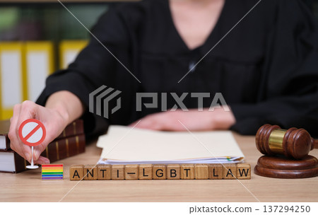 Courtroom scene highlights the struggle against anti-LGBT laws through powerful symbols of justice and equality during a legal proceeding 137294250