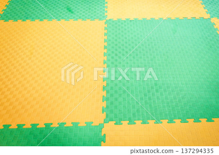 Interlocking EVA Foam Mats Form Modular Flooring Pattern 137294335