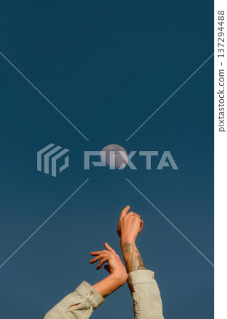 Human Hands Reaching for the Moon Concept Human Hands Reaching for the Moon Concept 137294488