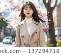 A woman walking in the spring city 137294718