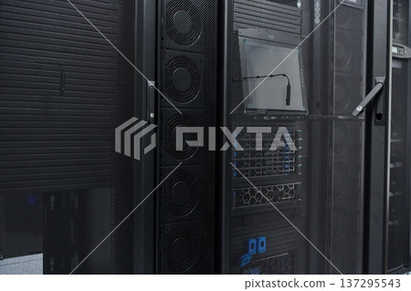 Server rack and network equipment inside a secure data center cabinet with ventilation mesh Server rack and network equipment inside a secure data center cabinet with ventilation mesh 137295543
