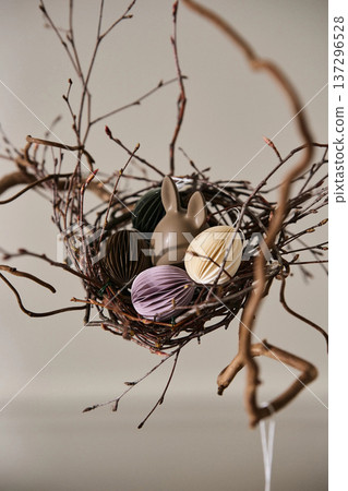 Colorful Paper Eggs and Chocolate Rabbit in Nest Colorful Paper Eggs and Chocolate Rabbit in Nest 137296528
