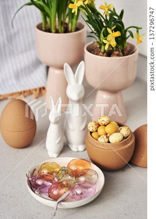 Decorative Bunnies with Easter Eggs and Yellow Flowers Elegant Easter Interior Decor Decorative Bunnies with Easter Eggs and Yellow Flowers Elegant Easter Interior Decor 137296747