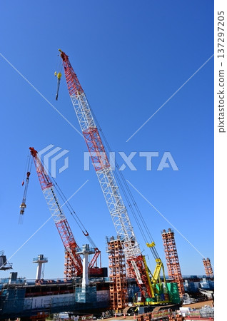 Crane being used for bridge construction Crane being used for bridge construction 137297205