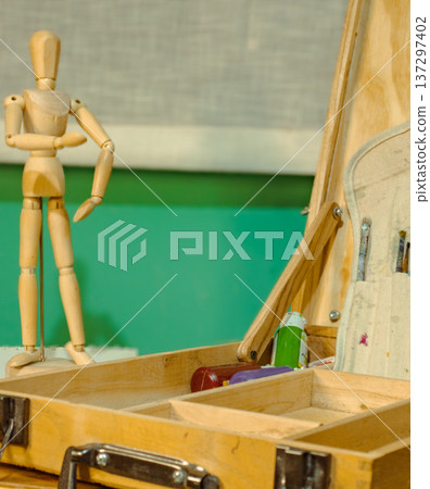Art supplies and wooden mannequin for creative inspiration Art supplies and wooden mannequin for creative inspiration 137297402