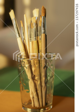 Paintbrushes standing in glass, inspiring creativity and art 137297416
