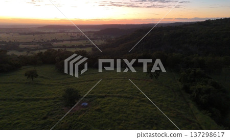 Aerial view of rural pasture fields at sunrise Aerial view of rural pasture fields at sunrise 137298617