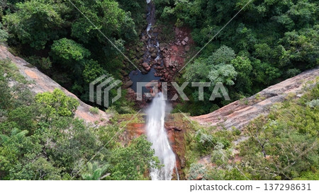 Cassilandia, Mato Grosso do Sul, Brazil - 04 05 2024: Cachoeira do Socorro waterfall aerial view Cassilandia, Mato Grosso do Sul, Brazil - 04 05 2024: Cachoeira do Socorro waterfall aerial view 137298631