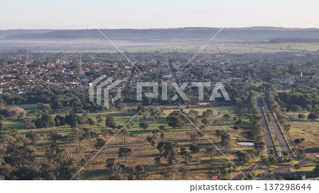 Cassilandia, Mato Grosso do Sul, Brazil - 04 05 2024: Sunrise aerial cityscape Cassilandia, Mato Grosso do Sul, Brazil - 04 05 2024: Sunrise aerial cityscape 137298644