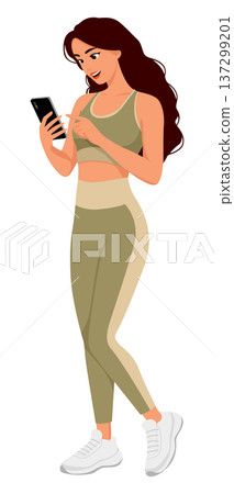 Woman fitness outfit holding smart phone Woman fitness outfit holding smart phone 137299201
