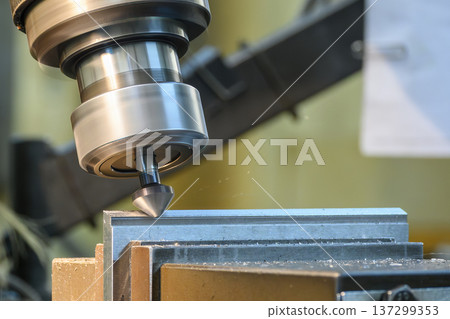 Precision chamfering of a heavy metal plate using an NC milling machine and specialized chamfer tool for edge preparation. 137299353