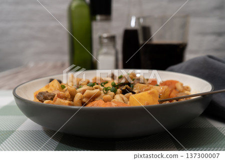 Hearty beef goulash stew with maccheroni pasta Hearty beef goulash stew with maccheroni pasta 137300007