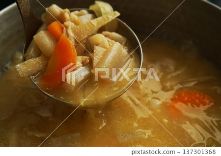 Pork soup ingredients scooped out of the pot 137301368