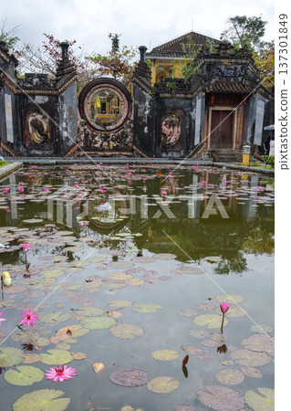 The Three Gates and Lotus Pond of Ba Mu Pagoda, Hoi An, Vietnam The Three Gates and Lotus Pond of Ba Mu Pagoda, Hoi An, Vietnam 137301849