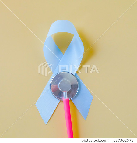 blue ribbon sign with stethoscope,health care concept. blue ribbon sign with stethoscope,health care concept. 137302573