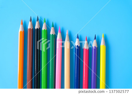 Group of colored pencils on color background. Group of colored pencils on color background. 137302577