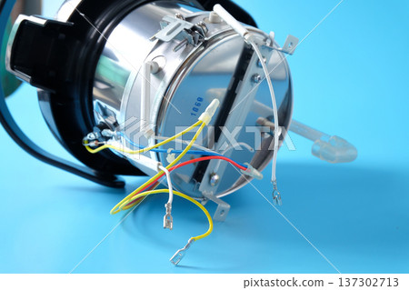 Repairing electric kettle. Repair of burnt or broken household appliances . Repairing electric kettle. Repair of burnt or broken household appliances . 137302713