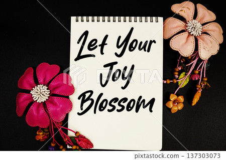 Let Your Joy Blossom Motivational and Inspirational quote written on notepad Let Your Joy Blossom Motivational and Inspirational quote written on notepad 137303073