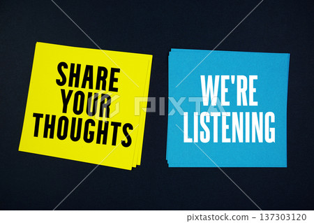 Share Your Thoughts and We're Listening text written on sticky note on black background 137303120