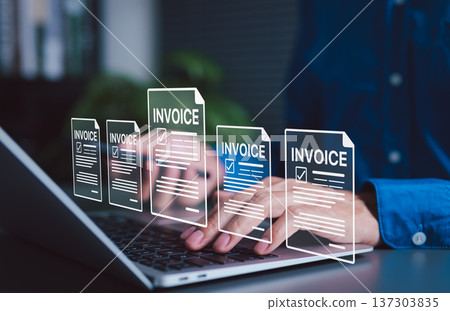 Digital Invoicing and Financial Document Management Concept. Businessman interact with digital invoice icons on laptop. online billing, E-Invoice, financial technology, paperless document processing, Digital Invoicing and Financial Document Management Concept. Businessman interact with digital invoice icons on laptop. online billing, E-Invoice, financial technology, paperless document processing, 137303835