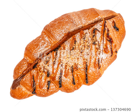 Sweet Croissant with Caramel and Chocolate Topping Isolated on Light Background 137304690