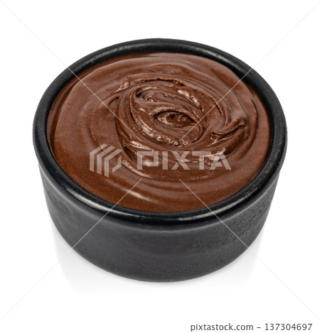 Chocolate Cream in Black Bowl Isolated on Light Background 137304697