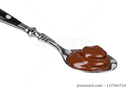 Spoon with Smooth Chocolate Spread Isolated on Light Background Spoon with Smooth Chocolate Spread Isolated on Light Background 137304710
