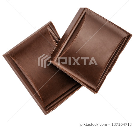 Dark chocolate squares isolated on light background Dark chocolate squares isolated on light background 137304713