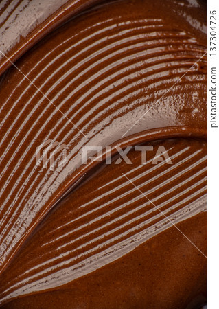 Chocolate Cream Texture with Spoon Lines Macro Background 137304726
