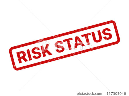 Bold red rubber stamp featuring the important phrase RISK STATUS with a distressed grunge effect texture on paper Bold red rubber stamp featuring the important phrase RISK STATUS with a distressed grunge effect texture on paper 137305046