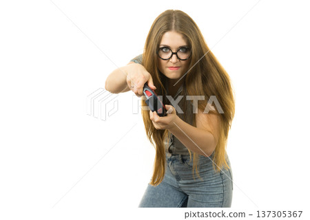 Gamer woman holding gaming pad 137305367