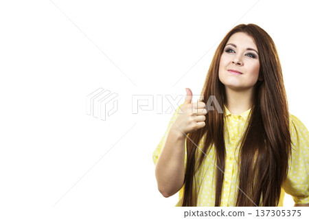 Cheerful woman showing thumb up 137305375