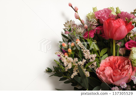 Floral background with pink roses, tulips, and hypericum berries. Space for your text. 137305529