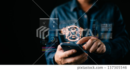 person use smartphone with glow AI icon and futuristic data dashboard representing artificial intelligence,analytics,cloud computing,automation,digital transformation,and modern technology innovation. person use smartphone with glow AI icon and futuristic data dashboard representing artificial intelligence,analytics,cloud computing,automation,digital transformation,and modern technology innovation. 137305546