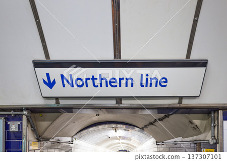 Northern line sign pointing down inside a London Underground station Northern line sign pointing down inside a London Underground station 137307101