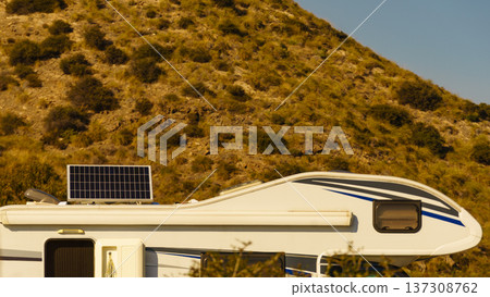 Caravan with tilt solar panel on roof. Caravan with tilt solar panel on roof. 137308762
