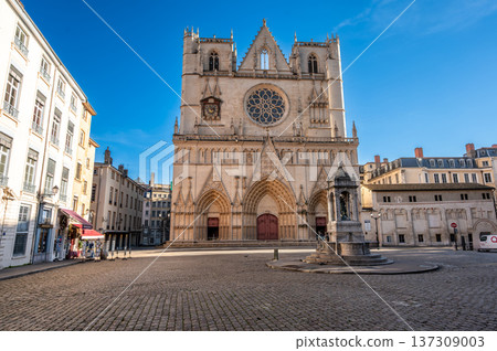 Lyon, france. December 27, 2023. Lyon cathedral facade with romanesque and gothic architecture, illuminated by soft morning light in vieux lyon cobblestone square 137309003