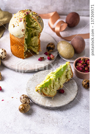 Traditional Easter cake kulich with pistachio Traditional Easter cake kulich with pistachio 137309571