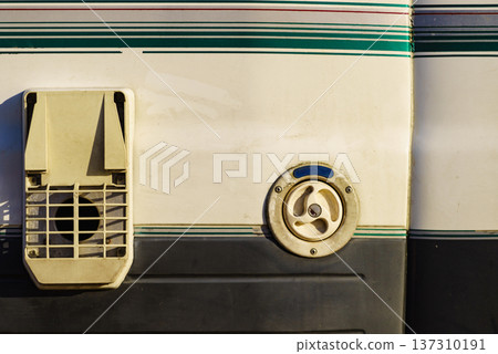 Camper detail. Chimney ventilation plate and water tank cap. 137310191