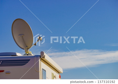 Satellite dish on roof of caravan 137310192