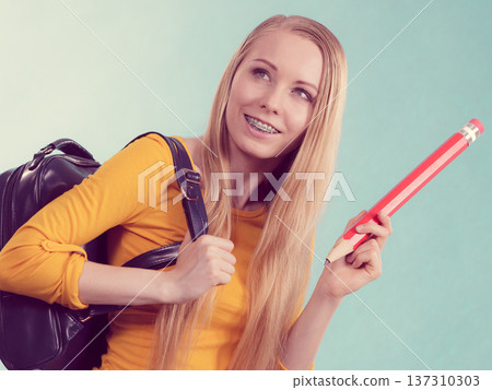 Young woman going to school Young woman going to school 137310303