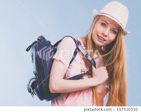 Young woman going to school Young woman going to school 137310310