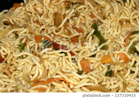 A Close up of delicious fried noodles dinner with vegetables 137310433
