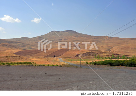 Iran, World Heritage Site, Takht-e Soleyman (Solomon's Throne), overlooking the orchard Iran, World Heritage Site, Takht-e Soleyman (Solomon's Throne), overlooking the orchard 137311285