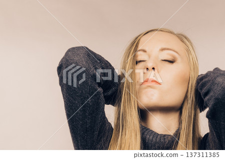 Sad confused young female Sad confused young female 137311385