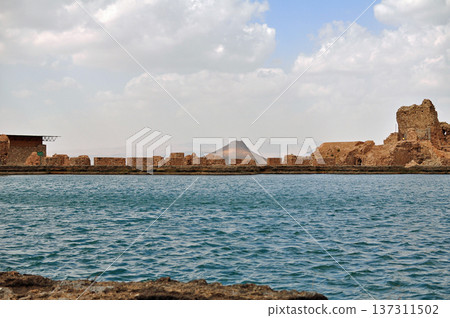 Iran: Zendane Soleyman seen across Lake Takht-e Soleyman 137311502
