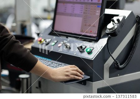 operator working with computerized equipment 137311583