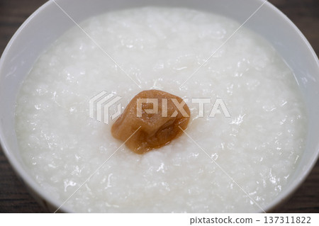 Pickled plum porridge 137311822