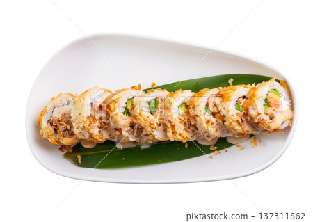 sushi rolls on green leaf on white ceramic plate 137311862