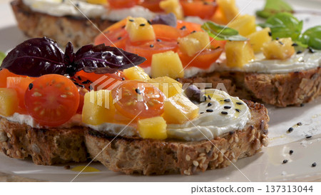 Italian bruschetta with roasted tomatoes Italian bruschetta with roasted tomatoes 137313044